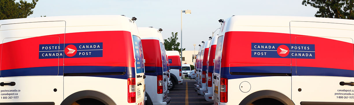 Image of Canada Post delivery trucks